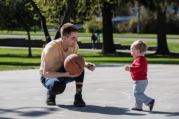 Jacob and Jacob, two BYU-Idaho students, play one on one basketball at the Smith Park court.