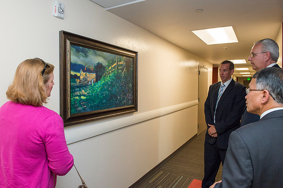 Elder and Sister Hamula take a tour of Centre Square and admire some of the Church History art work done by artist Al Rounds.