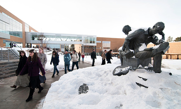 Winter semester students walking around campus following Tuesday Devotional