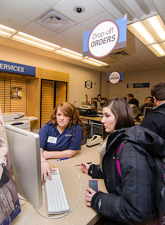 Students gather for the grand opening of Express Print and Copy.