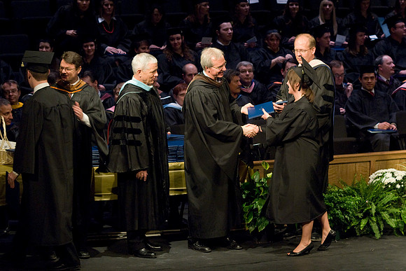Convocation for Performing and Visual Arts. Carolee Coy receiving her diploma cover.