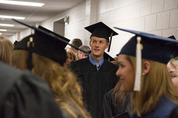 Fall 2008 graduate students enter hart auditorium. Commencement processional line.