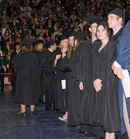 Fall 2008 graduate students enter hart auditorium. Commencement processional line.