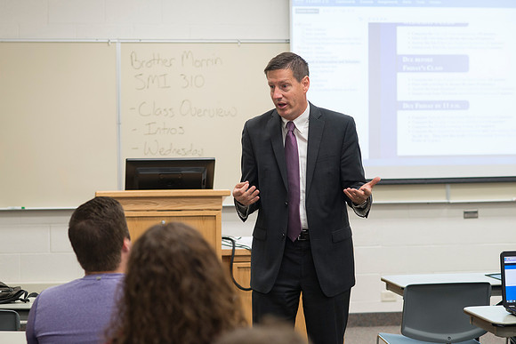 Business Management Faculty, Jeff Morrin, teaching an Advanced Financial Management class in Smith 440.