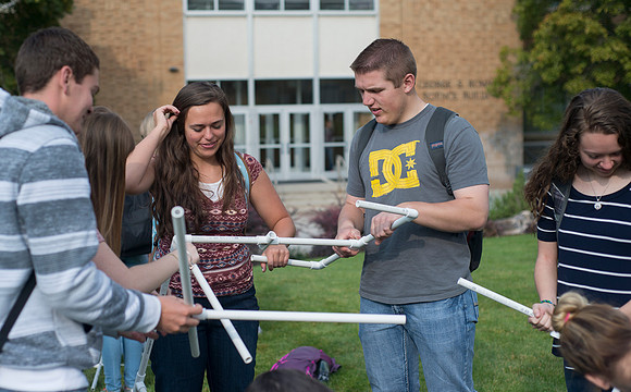 Spencer Haacke teaches a course on College Success. Students had a team building exercise.