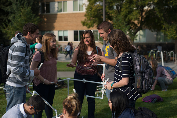 Spencer Haacke teaches a course on College Success. Students had a team building exercise.