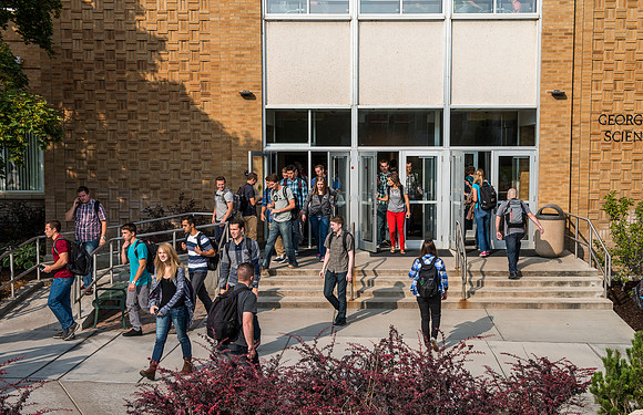 Students walk to and from class.