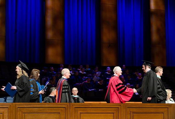President Kim B. Clark congratulates winter 2013 graduates.