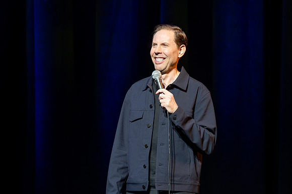 Ryan Hamilton performs a stand-up routine at the BYU-Idaho I-Center.