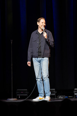 Ryan Hamilton performs a stand-up routine at the BYU-Idaho I-Center.