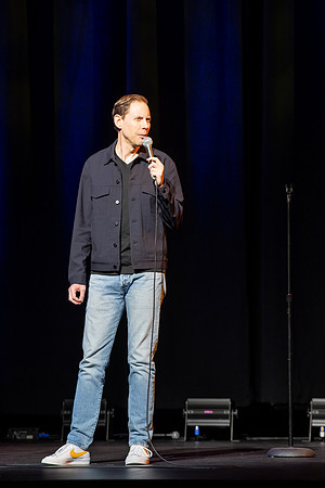 Ryan Hamilton performs a stand-up routine at the BYU-Idaho I-Center.