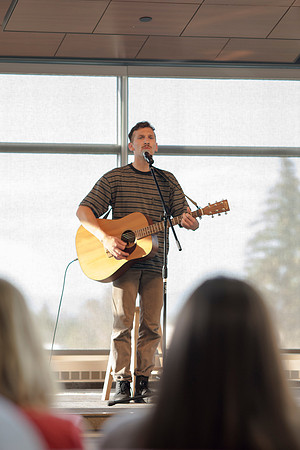 Aaron McCall performs during The Last Voice Standing in the Crossroads, Wednesday night during the 2014 Spring Semester.