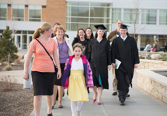 Graduates and their families on campus in between ceremonies, Winter 2013