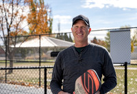 Dinking around playing pickleball for the HR Wellness Video.