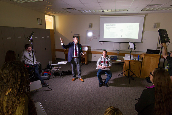 Brother Mawlam gives his students a hands on assignment during class on how to do a "lighted interview."