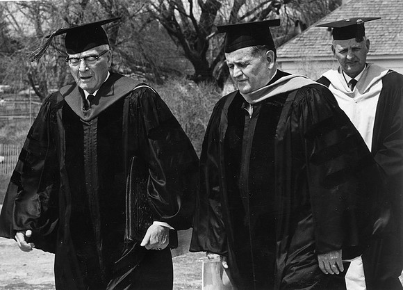 President John L. Clarke with Harold B. Lee, who later served as Prophet of the Church marching during the commencment processional in 1960.
