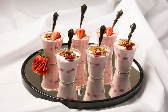 These strawberry and raspberry parfaits topped with homemade granola will leave your mouth watering for more.
