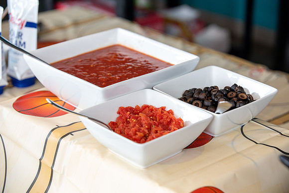 Residents of Centre Square On-Campus housing gather for nachos in anticipation of March Madness.