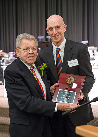 Pres Henry Eyring presents Wilson Brown with  the Eliza R. Snow Award.