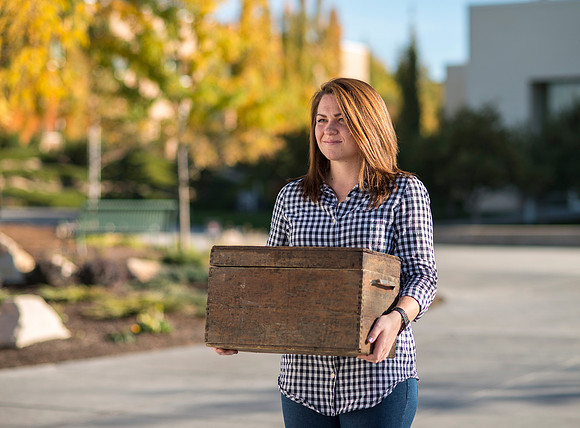Production of Wagon Box Prophecy. Taylor Ray in front of the Taylor Building.