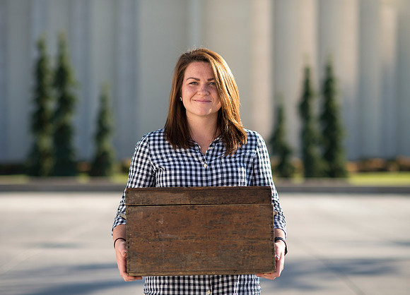 Production of Wagon Box Prophecy. Taylor Ray in front of the Taylor Building.