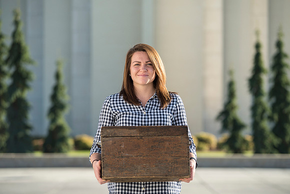Production of Wagon Box Prophecy. Taylor Ray in front of the Taylor Building.