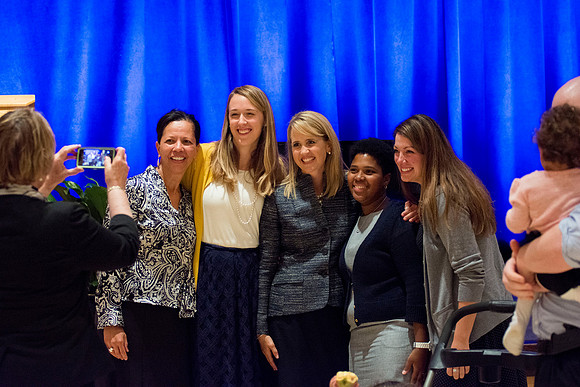 Sister Gilbert takes a picture with prior seminary students and friends.