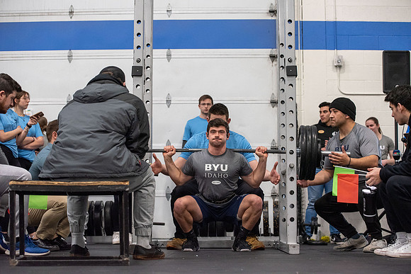 Men and Women compete in three rounds of weightlifting. Squat, Bench, and Deadlift.