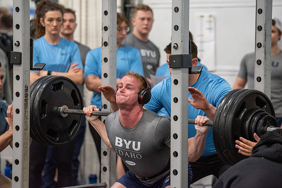 Men and Women compete in three rounds of weightlifting. Squat, Bench, and Deadlift.
