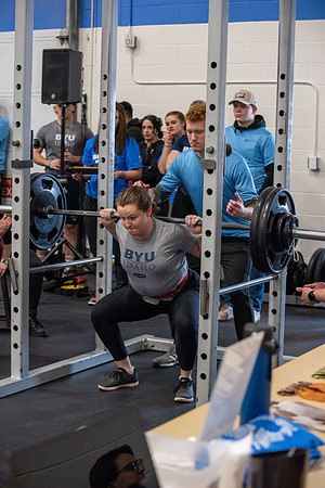 Men and Women compete in three rounds of weightlifting. Squat, Bench, and Deadlift.
