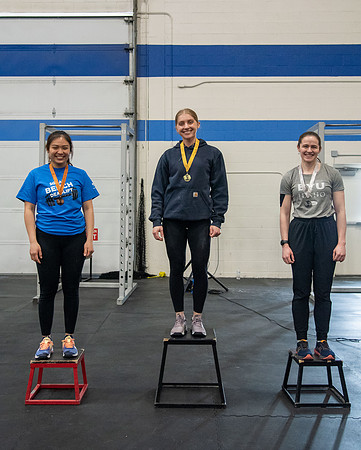 Men and Women compete in three rounds of weightlifting. Squat, Bench, and Deadlift.