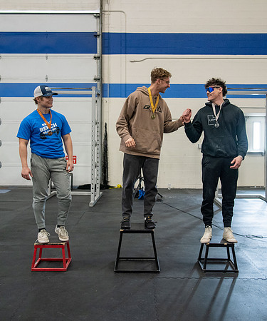 Men and Women compete in three rounds of weightlifting. Squat, Bench, and Deadlift.