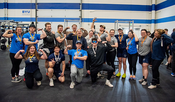 Men and Women compete in three rounds of weightlifting. Squat, Bench, and Deadlift.