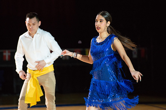 Students rehearse their performance for Cultural Night in the Hart Gym.