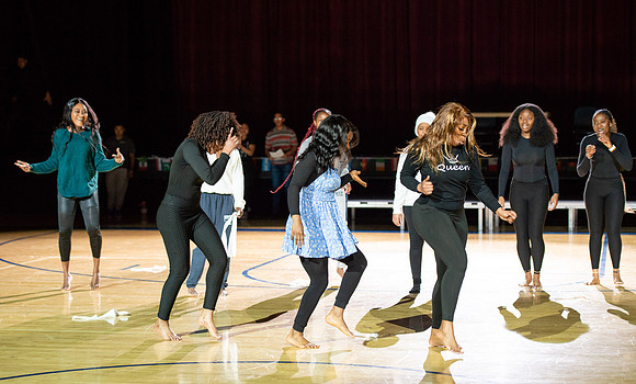 Students rehearse their performance for Cultural Night in the Hart Gym.