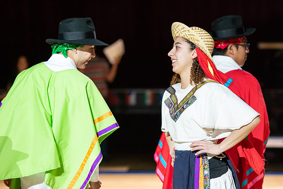 Students rehearse their performance for Cultural Night in the Hart Gym.