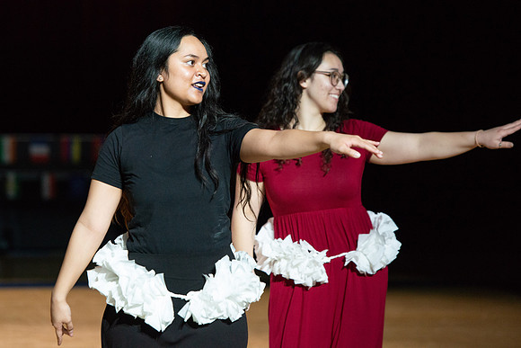 Students rehearse their performance for Cultural Night in the Hart Gym.
