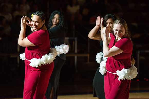 Students rehearse their performance for Cultural Night in the Hart Gym.