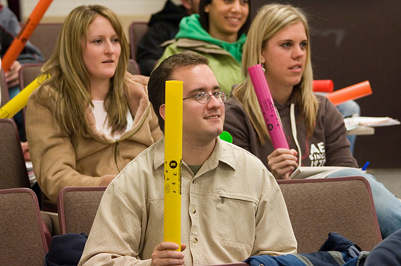 Brian Pyper teaches about the physics of sound using a bagpipe in a Physics Class .