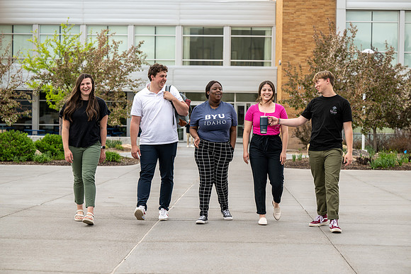 Student models for Admissions Viewbook cover options. May 2023