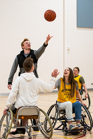 Students participate of Wheelchair Basketball in the Hart Gym.