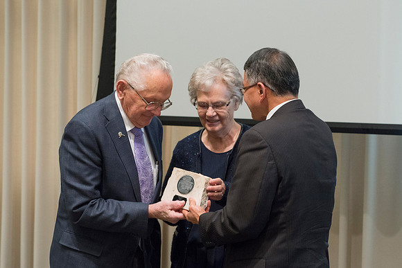 Vice President Kevin Myasaki presents the Alumni Award of Excellence to Vance & Diane Hendricks at the Emeritus Breakfast, Nov. 14, 2015.