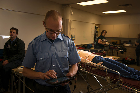 Cory Marriott and his peer pass off EMT requirements during lab held in the Clarke Building.