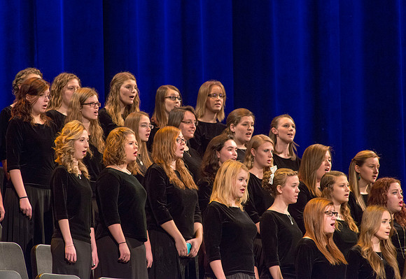 The Women's Choir performs the musical number during devotional.