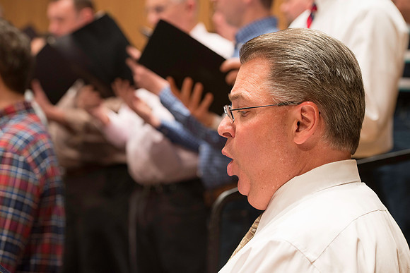 Ricks College Alumni from 1965 to 1995 gather for an A Cappella Choir reunion.