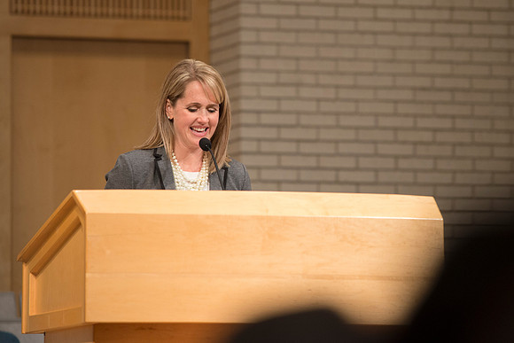 Sister GIlbert introduces Sister Bednar in A Gathering for Women in the Taylor Chapel.