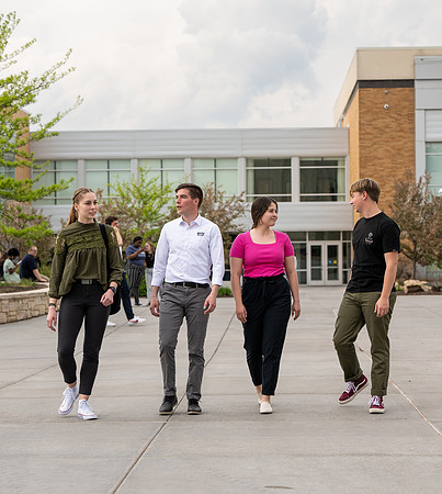 Student models for Admissions Viewbook cover options. May 2023