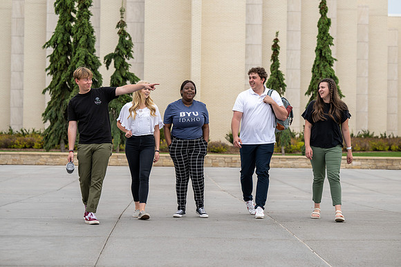 Student models for Admissions Viewbook cover options. May 2023