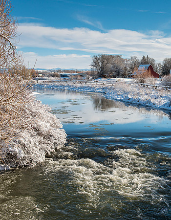 Winter scene of Teton River from bridge West of Rexburg on 3000 West.