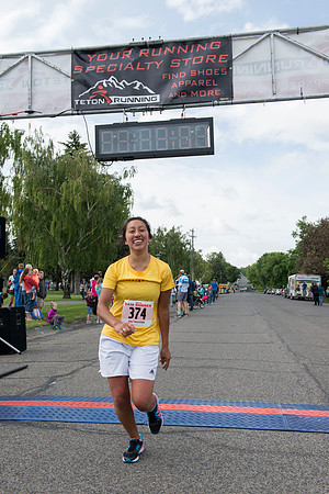 Teton Dam Marathon participants run towards the finish line at Smith Park in Rexburg, Idaho.